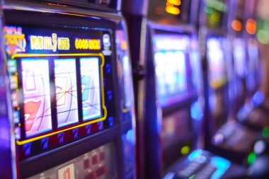 intanqq mobile app interface showing slot games and live casino options
